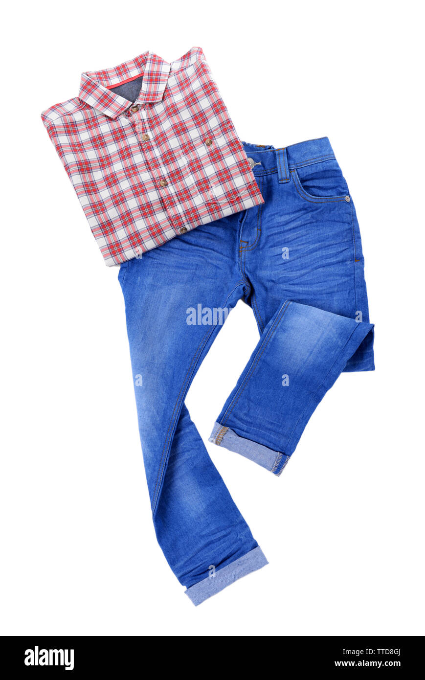 Blue jeans with red plaid shirt isolated on white background Stock