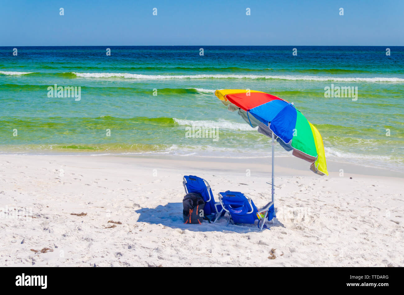 Umbrella And Chairs Set Up At Beach Shoreline Beautiful Tropical