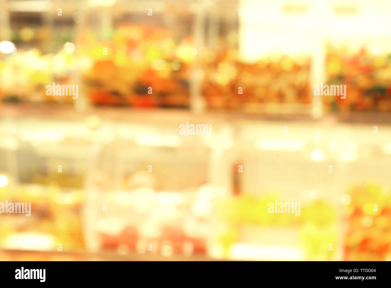 Colourful fruit jelly in plastic boxes, blurred Stock Photo Alamy