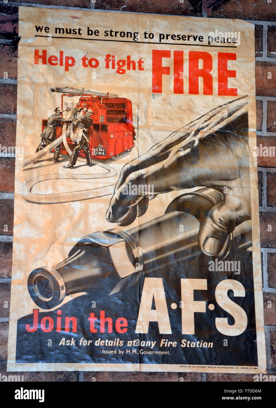Poster for the Auxiliary Fire Service, 1940s wartime. The Greater Manchester Fire Service Museum, in Rochdale, uk, is planning to start  construction work at its new location, the adjacent former Maclure Road fire station, later this year .The building will be fully restored to its 1930s condition by late 2020. The move to larger premises means that full-sized fire engines can be displayed, alongside many fascinating historic items of firefighting equipment. Stock Photo