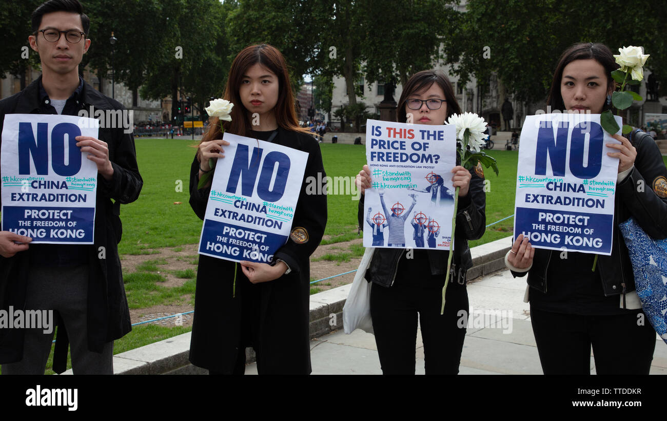 London, UK. 16th June 2019. Around 1000 demonstrators protest against the Extradition Law by the Hong Kong Government and its leader, Carrie Lam on Parliament Square, London, UK demanding British help in protecting freedom. The law would allow transfer of those suspected of crime, including political dissent, to be transferred to China. Credit: Joe Kuis / Alamy Stock Photo