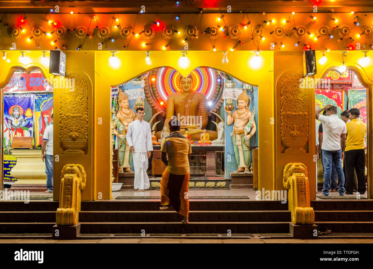 Pilrgrims Outside a Buddhist Temple, Kataragama, Sri Lanka Stock Photo