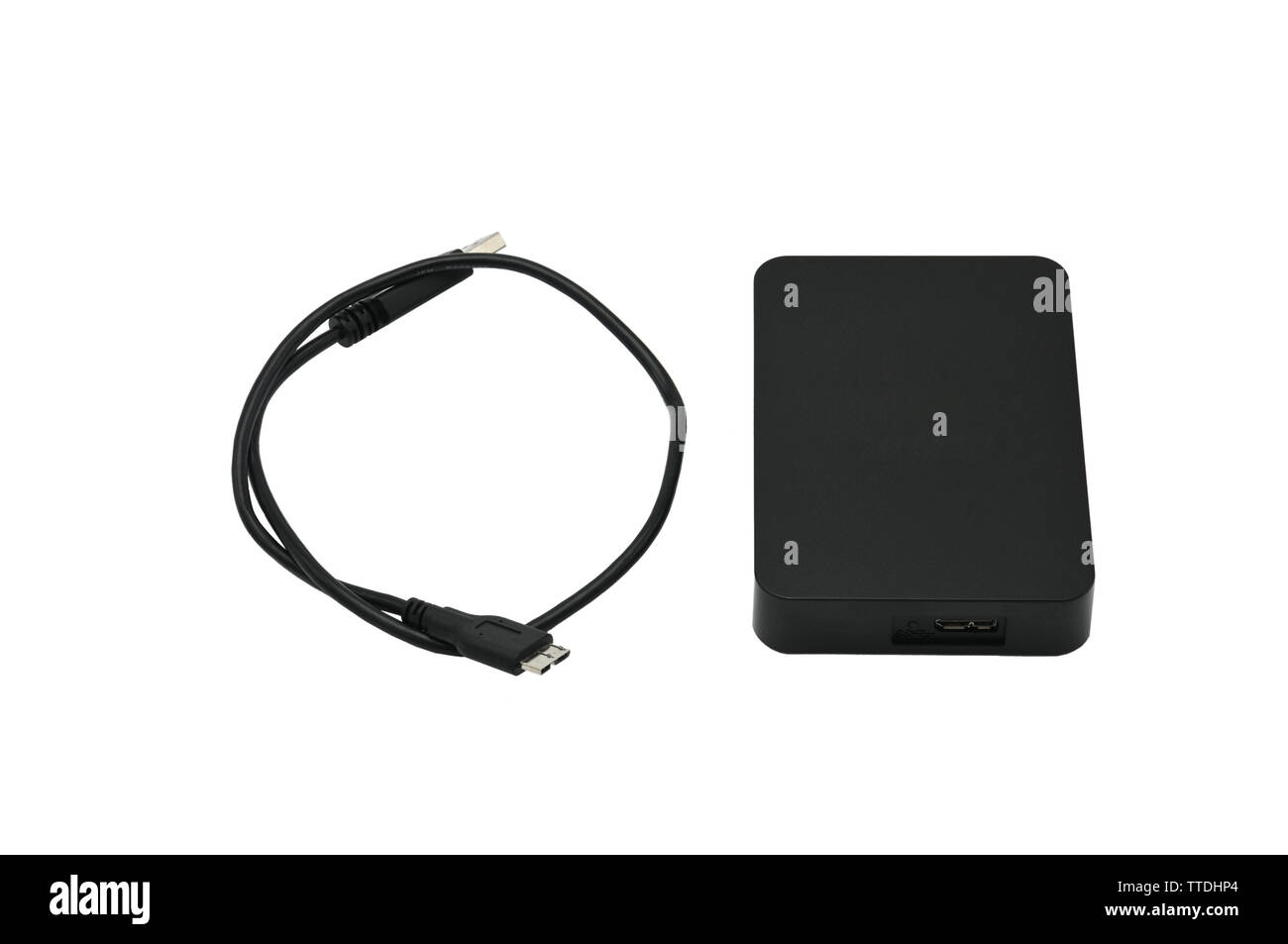 Portable hard drive for backing up various files on an isolated white ...