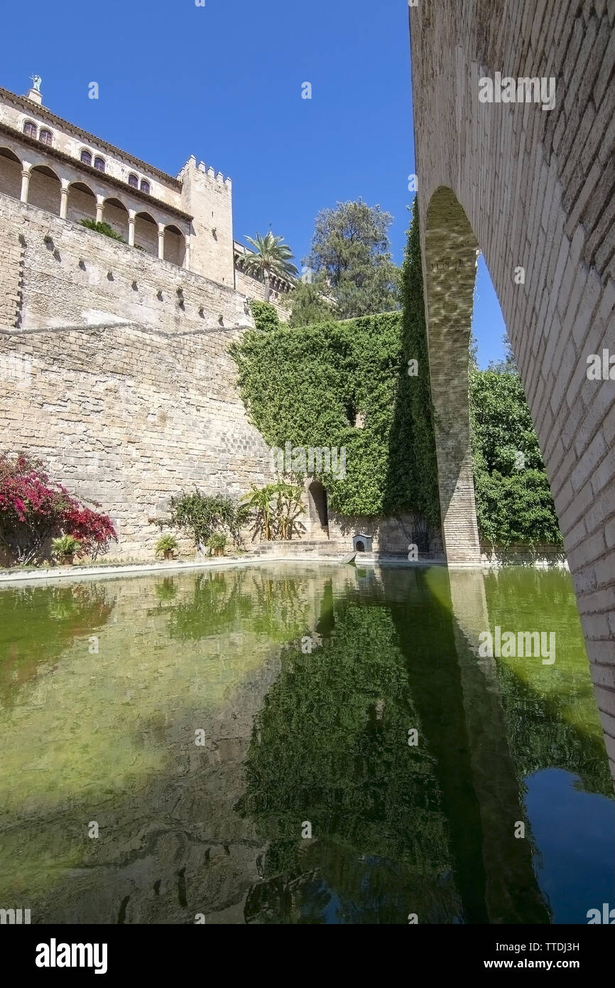 Almudaina palace view with vault and pond in Palma de Mallorca, Spain. Stock Photo