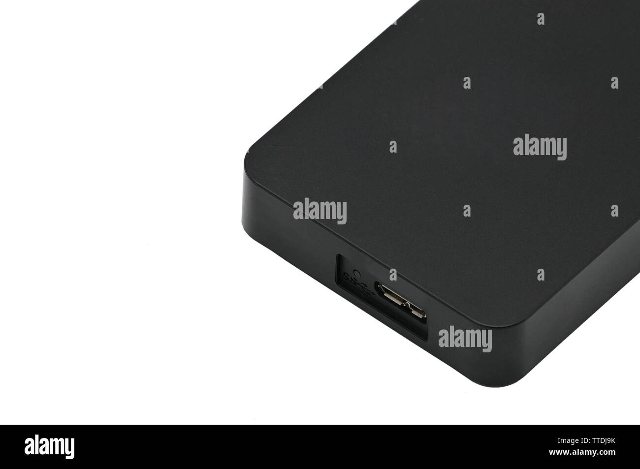 Portable hard drive for backing up various files on an isolated white ...