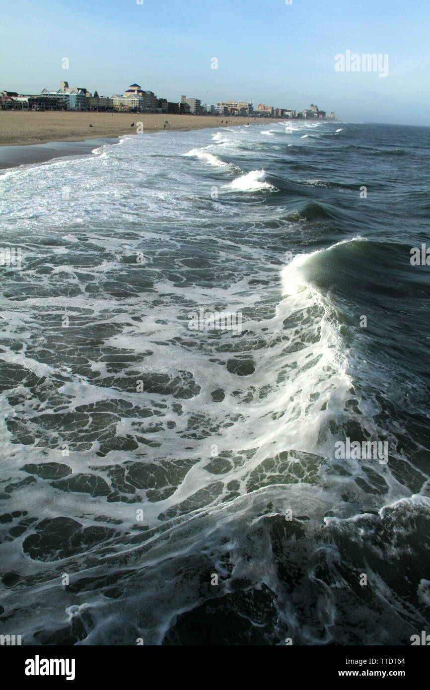 Waves touching the shore on the beach of Ocean City, Maryland, USA Stock Photo