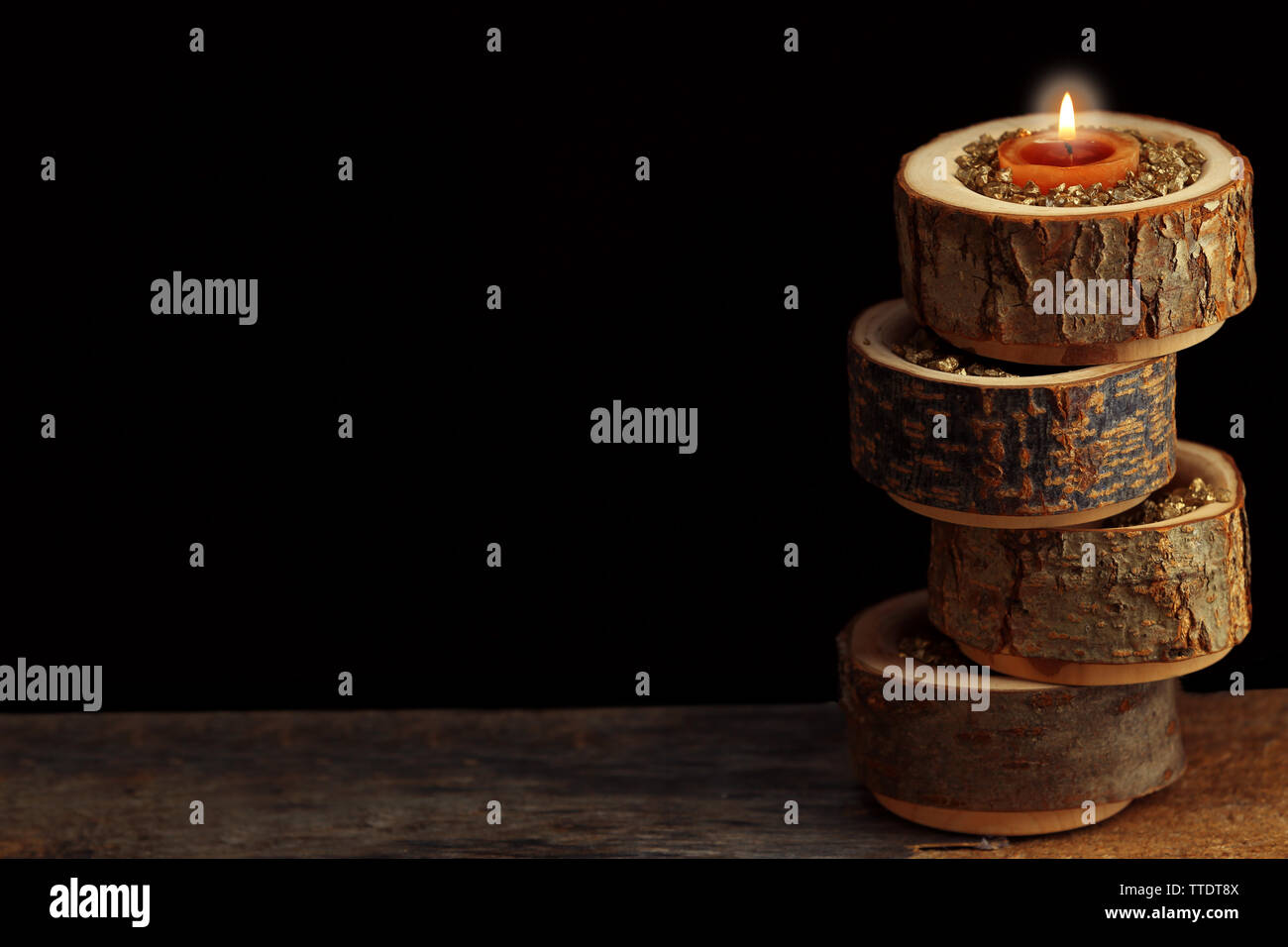 Composition of candle on black background Stock Photo