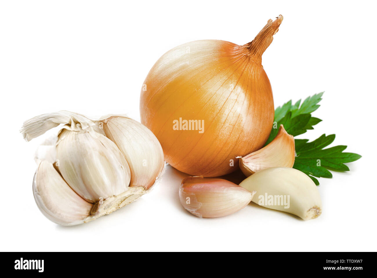 Garlic and onion with parsley leaves isolated on white Stock Photo - Alamy