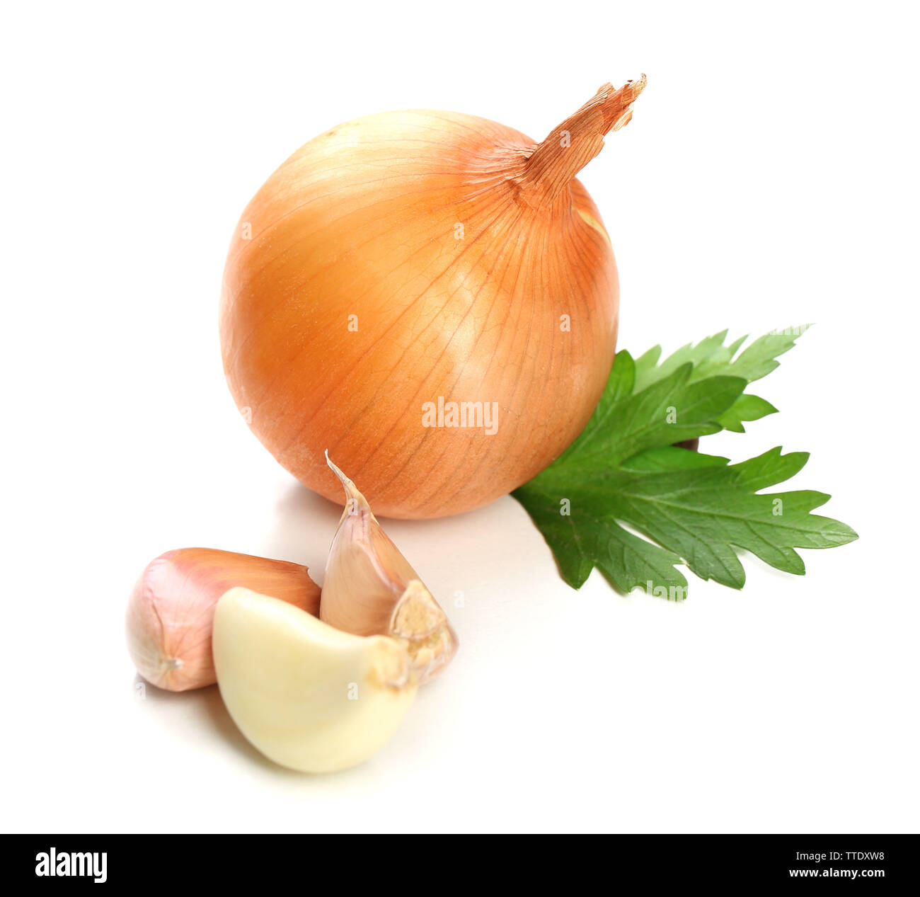 Garlic and onion with parsley leaves isolated on white Stock Photo - Alamy
