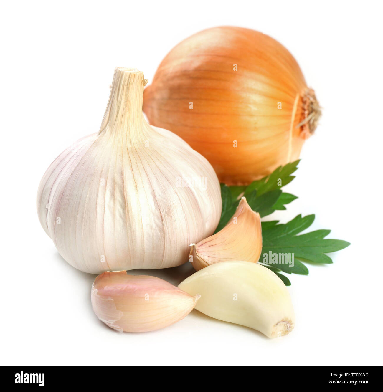 Garlic and onion with parsley leaves isolated on white Stock Photo - Alamy