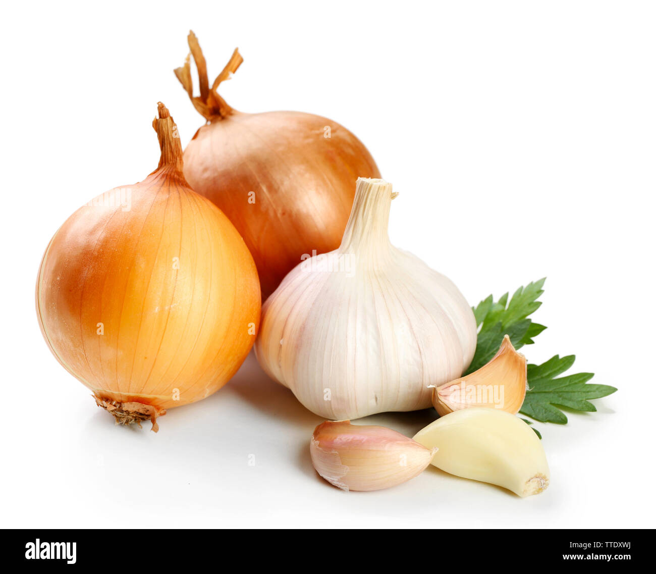 Garlic and onion with parsley leaves isolated on white Stock Photo - Alamy