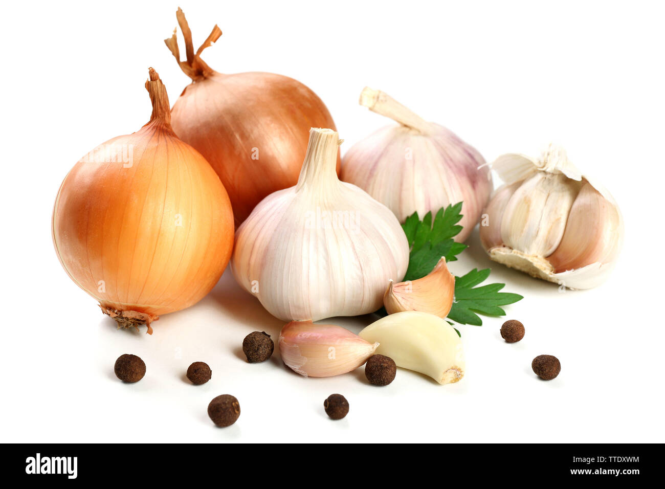 Garlic and onion with parsley leaves isolated on white Stock Photo - Alamy