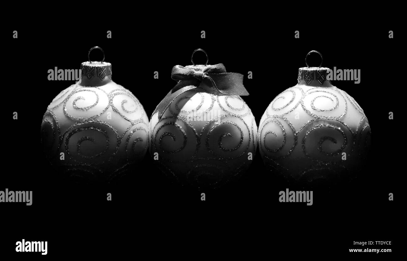 Three silver balls Black and White Stock Photos & Images - Alamy