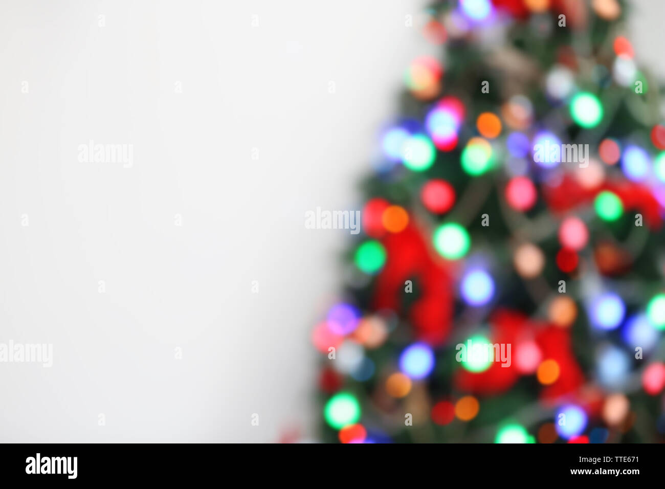 Christmas lights on Christmas tree of abstract background Stock Photo