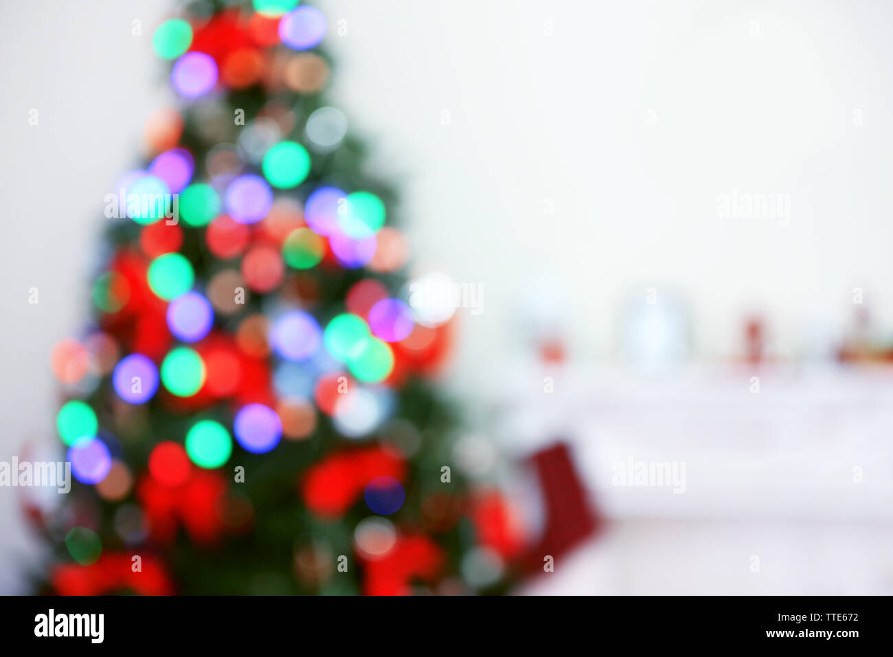 Christmas lights on Christmas tree of abstract background Stock Photo