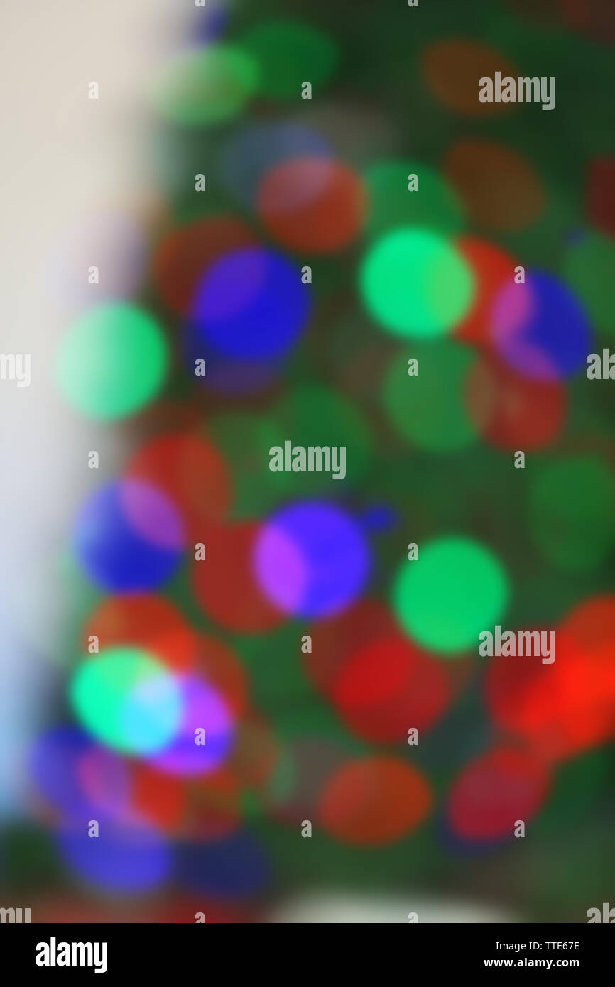 Christmas lights on Christmas tree of abstract background Stock Photo