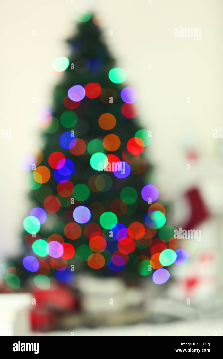 Christmas lights on Christmas tree of abstract background Stock Photo