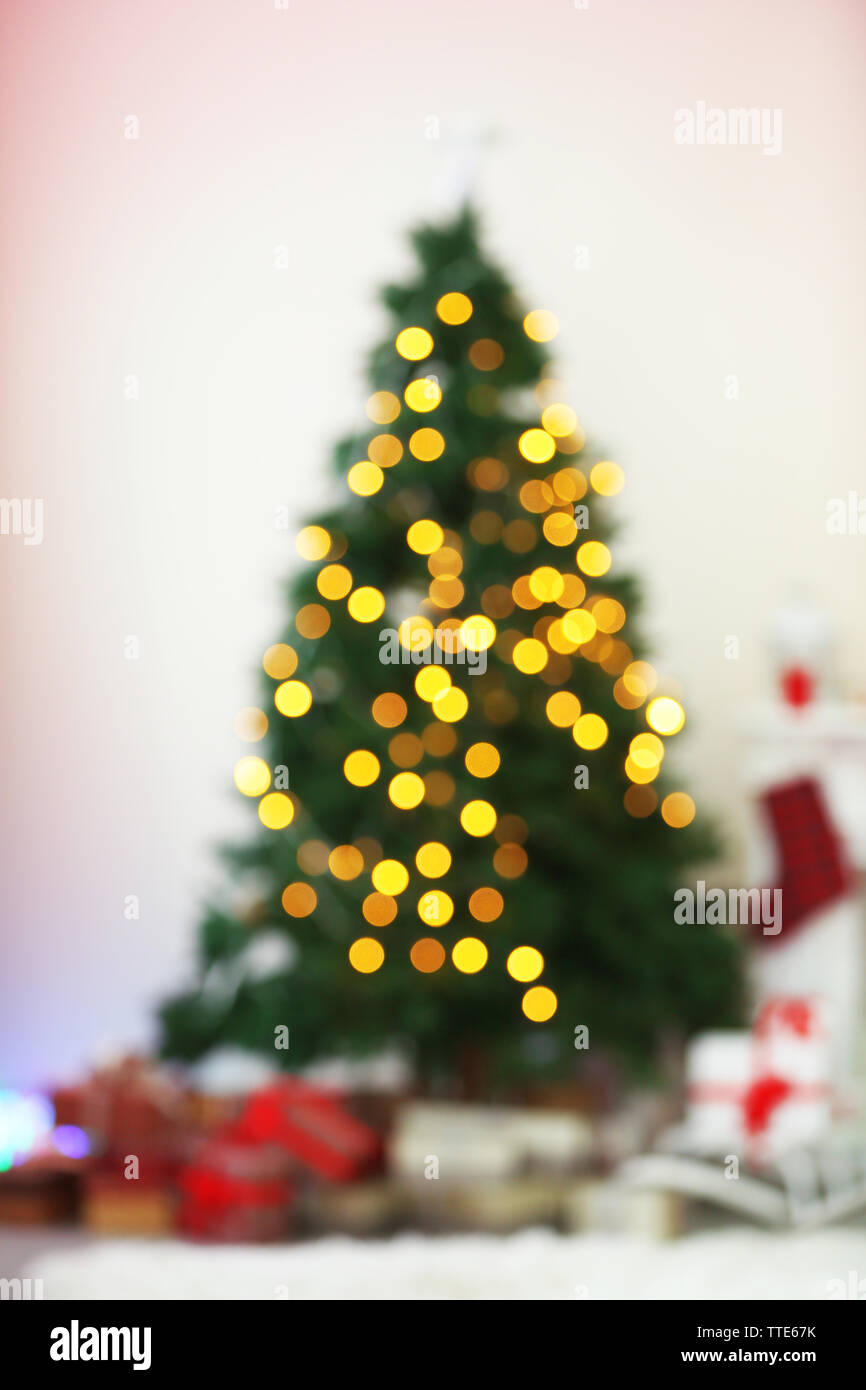 Christmas lights on Christmas tree of abstract background Stock Photo