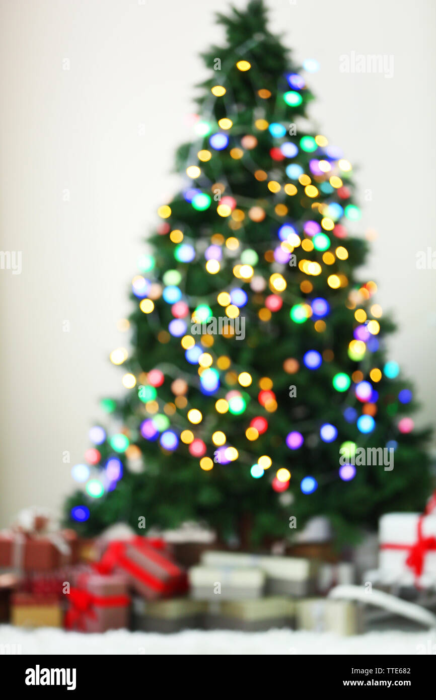 Christmas lights on Christmas tree of abstract background Stock Photo