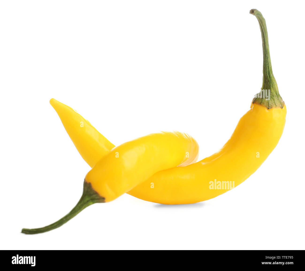 Yellow chili peppers isolated on white Stock Photo Alamy
