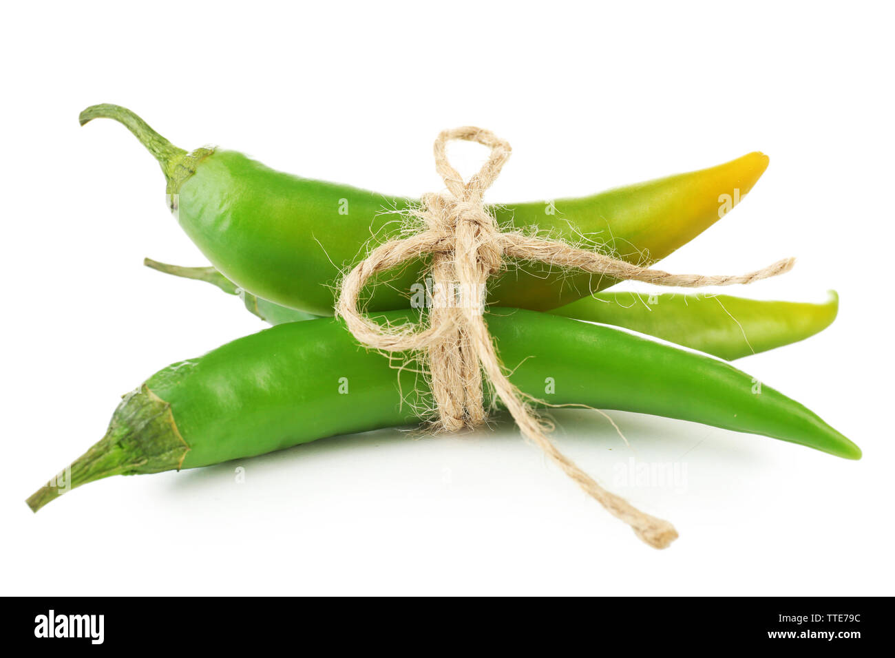 Green chili peppers isolated on white Stock Photo - Alamy