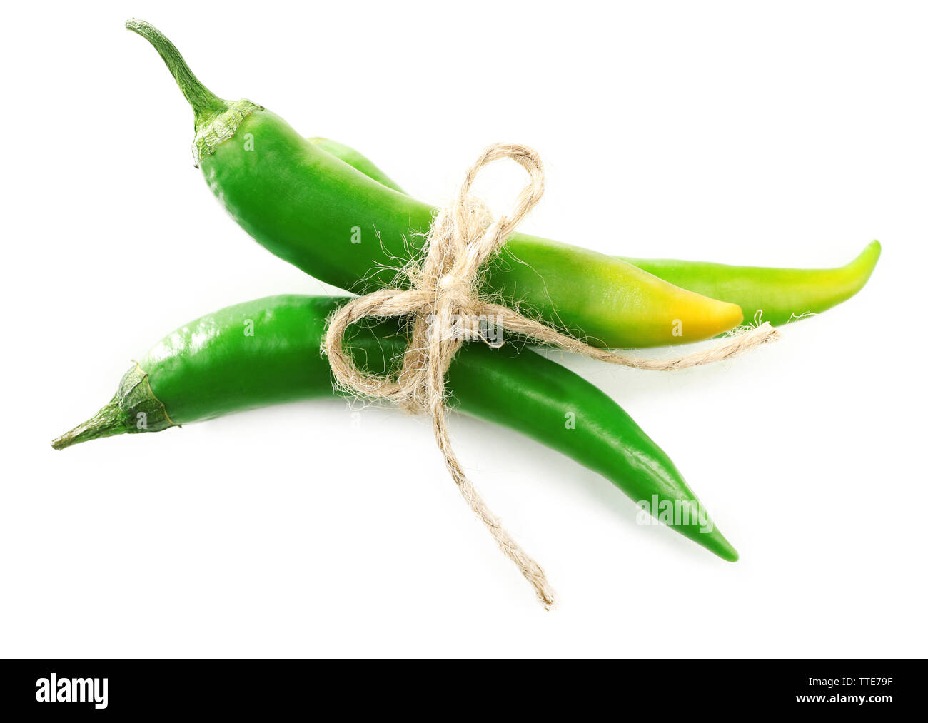 Green chili peppers isolated on white Stock Photo - Alamy