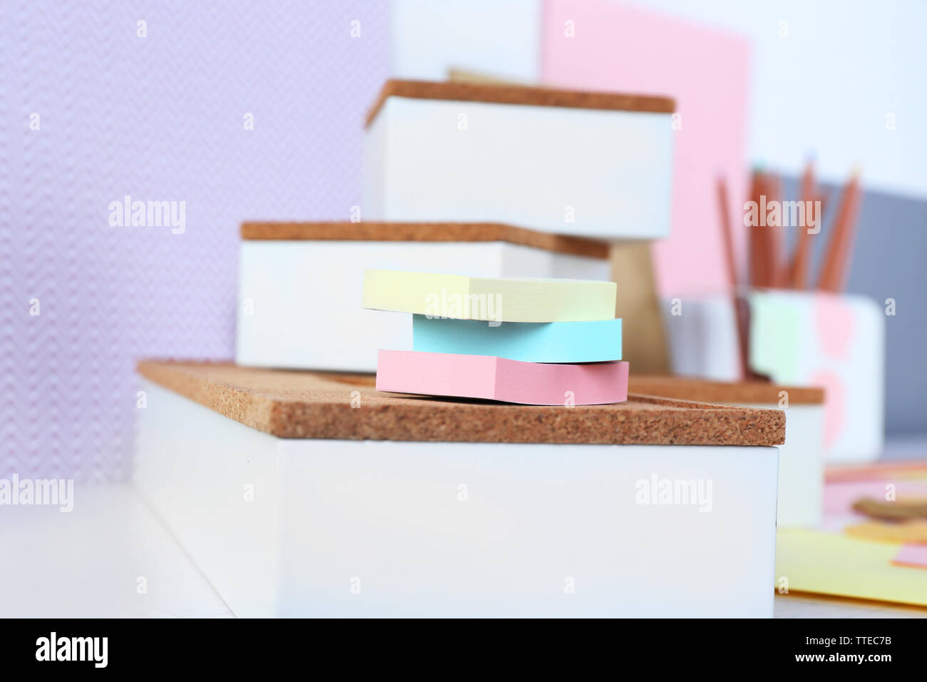 Table With Sticker Notes Set of coloured note stickers on a table Stock Photo - Alamy
