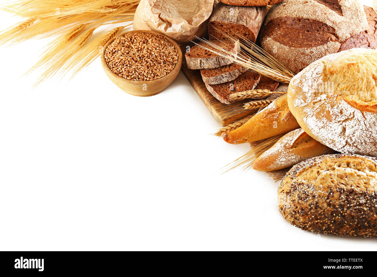 Fresh baked bread and wheat, isolated on white Stock Photo Alamy