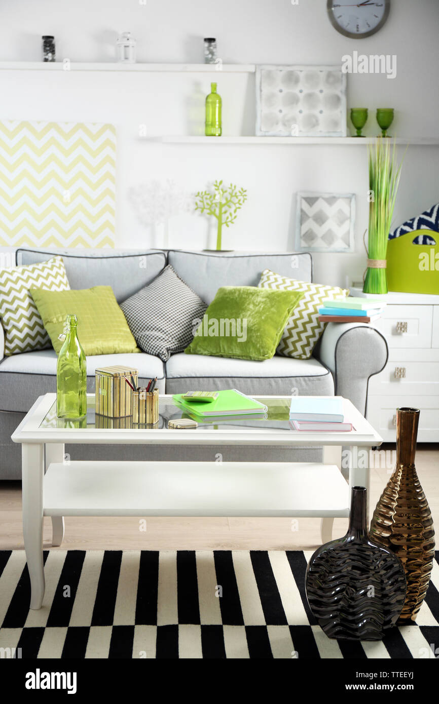 Living room interior with sofa and table Stock Photo - Alamy
