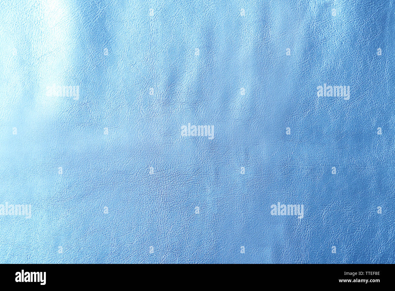 Blue leather texture with crumpled uneven surface Stock Photo