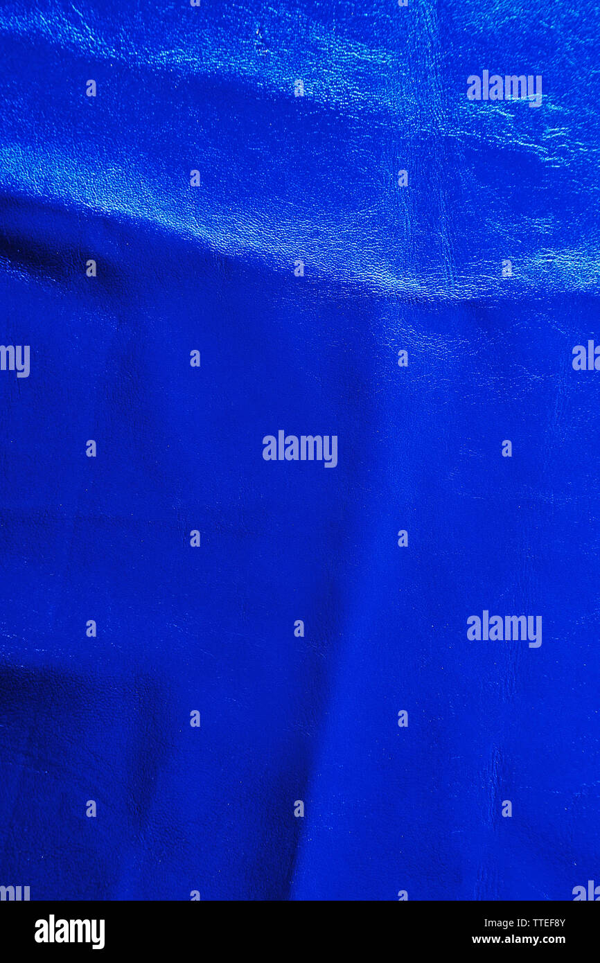Blue leather texture with crumpled uneven surface Stock Photo