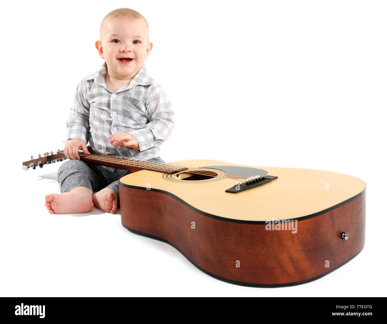 Cute baby with guitar isolated on white background, close up Stock
