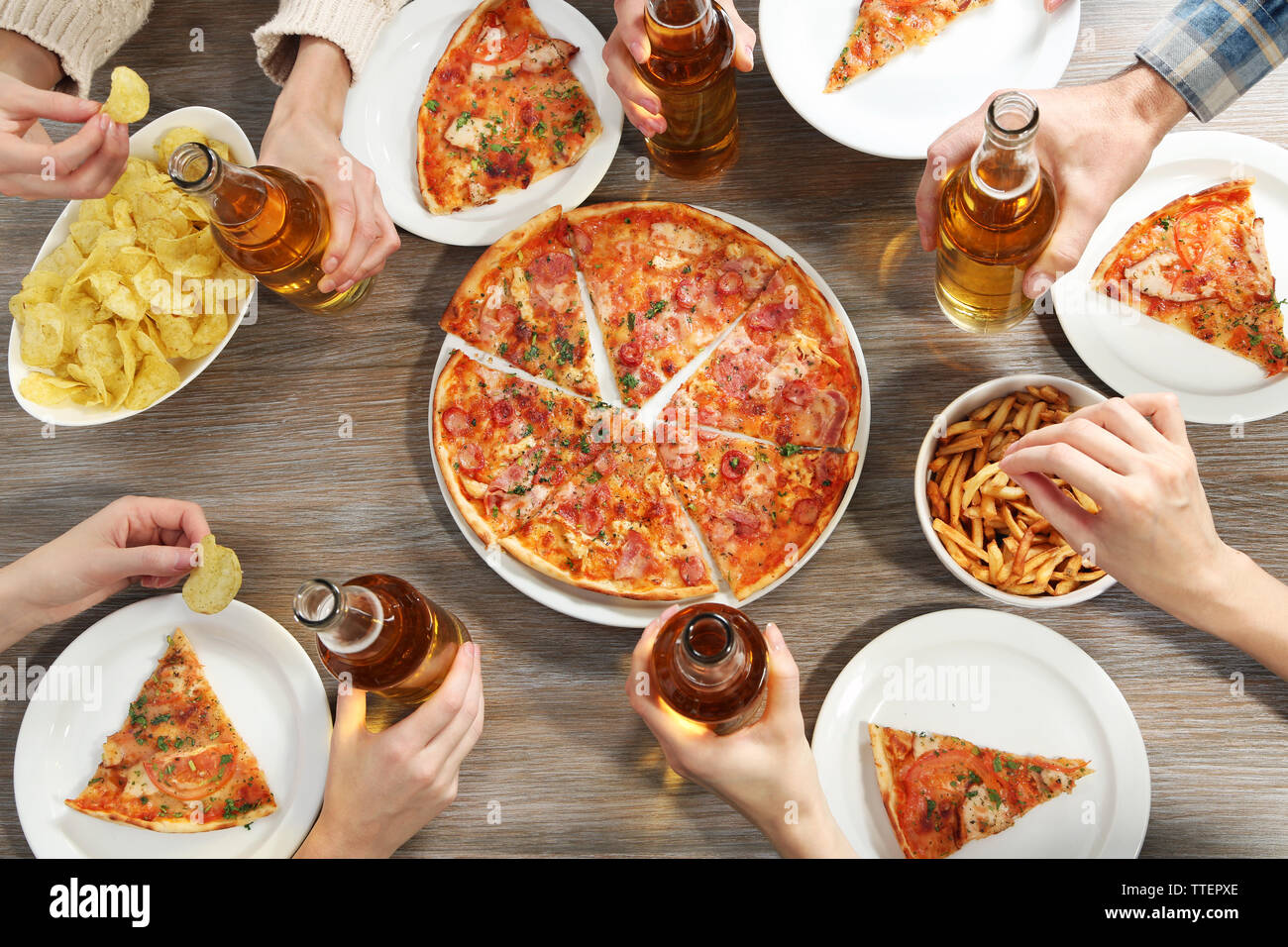Pizza party drinks hires stock photography and images Alamy