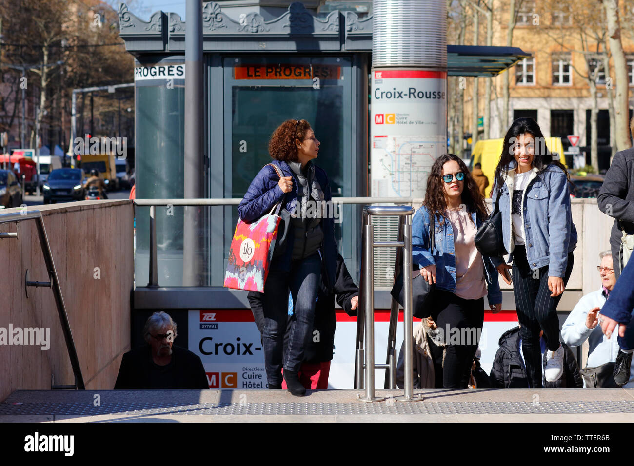 Weekend shoppers and thrill seekers in the Croix Rousse, Lyon, France Stock Photo