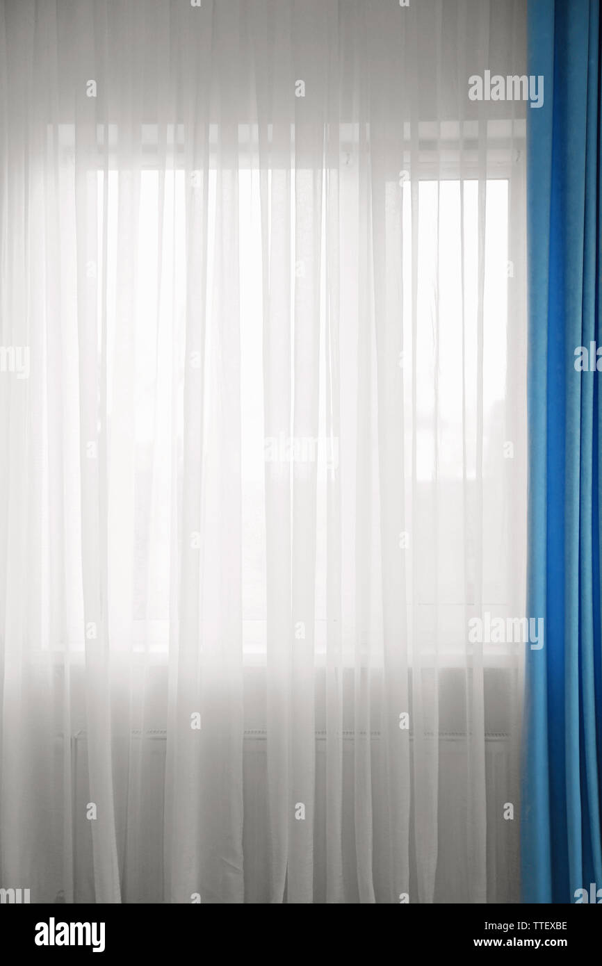 Cozy window blue curtains hi-res stock photography and images - Alamy