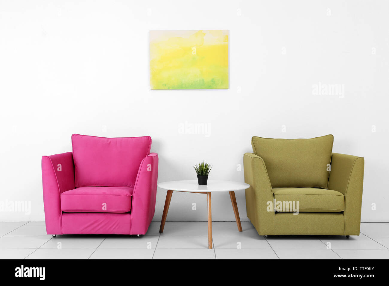 Living Room Interior With Pink Green Armchairs White Table And Plant On White Wall Background Stock Photo Alamy