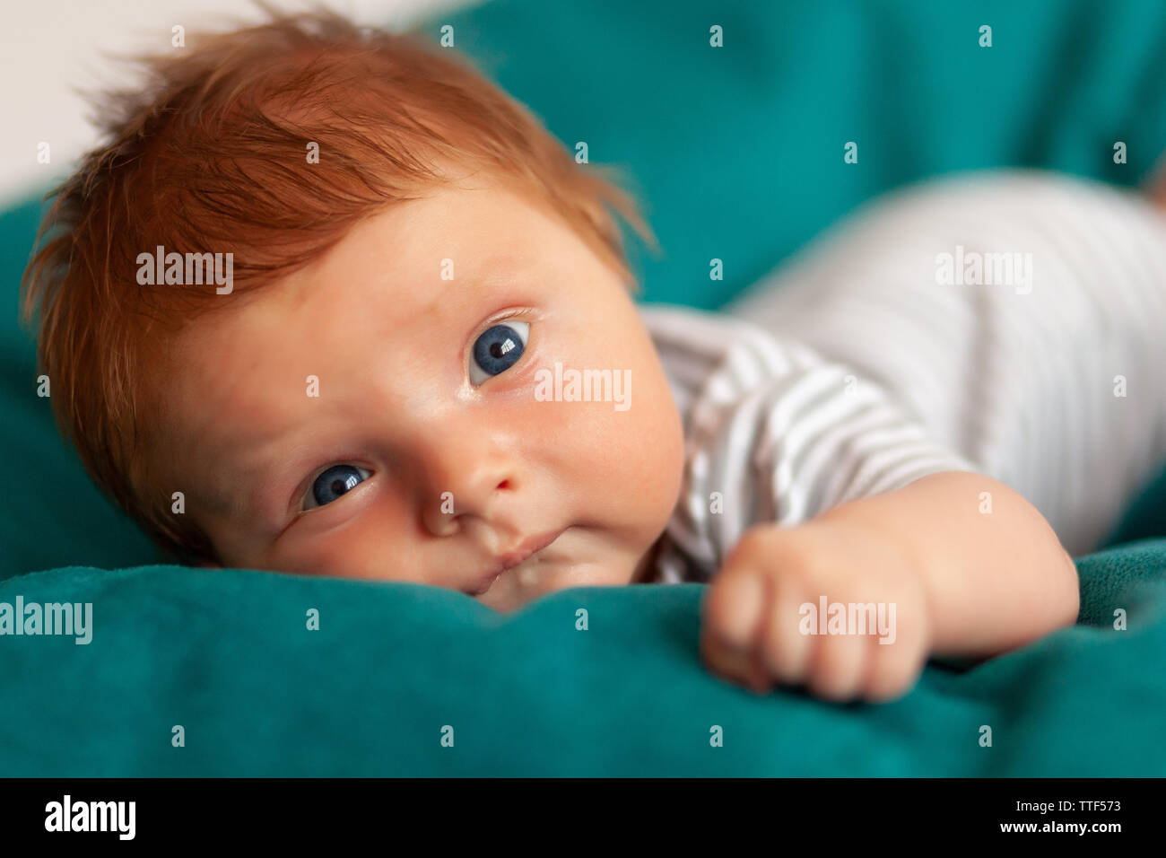 newborn with red hair