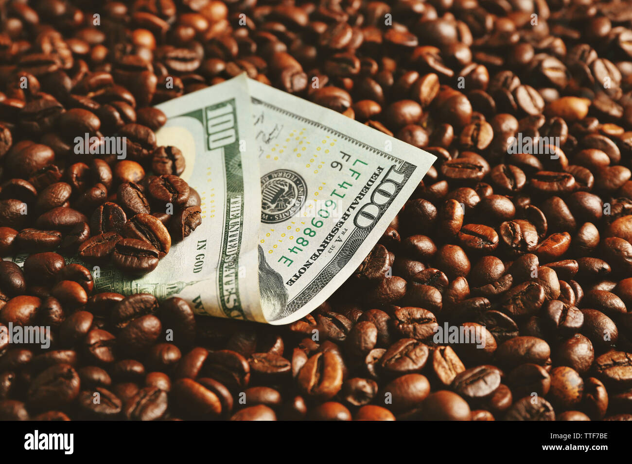 Coffee beans and US dollar banknote Stock Photo Alamy
