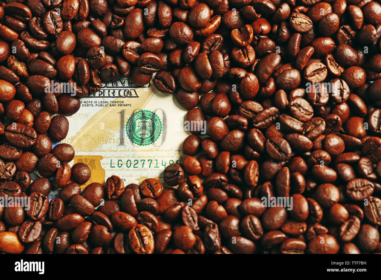 Coffee beans and US dollar banknote Stock Photo Alamy