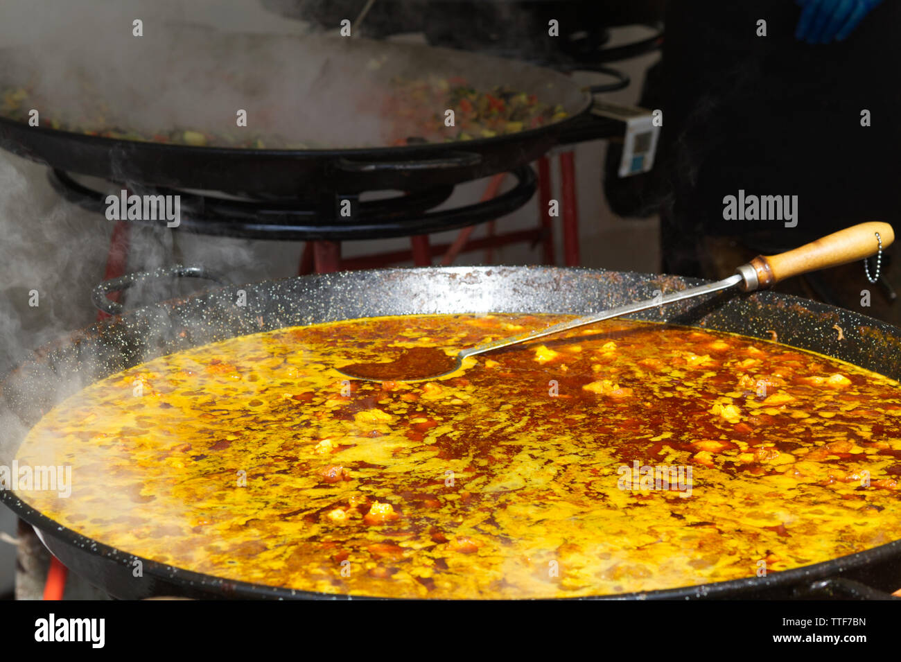 Large frying pan with rice and seafood in a street cafe, Stock Photo,  Picture And Rights Managed Image. Pic. ZON-15882810