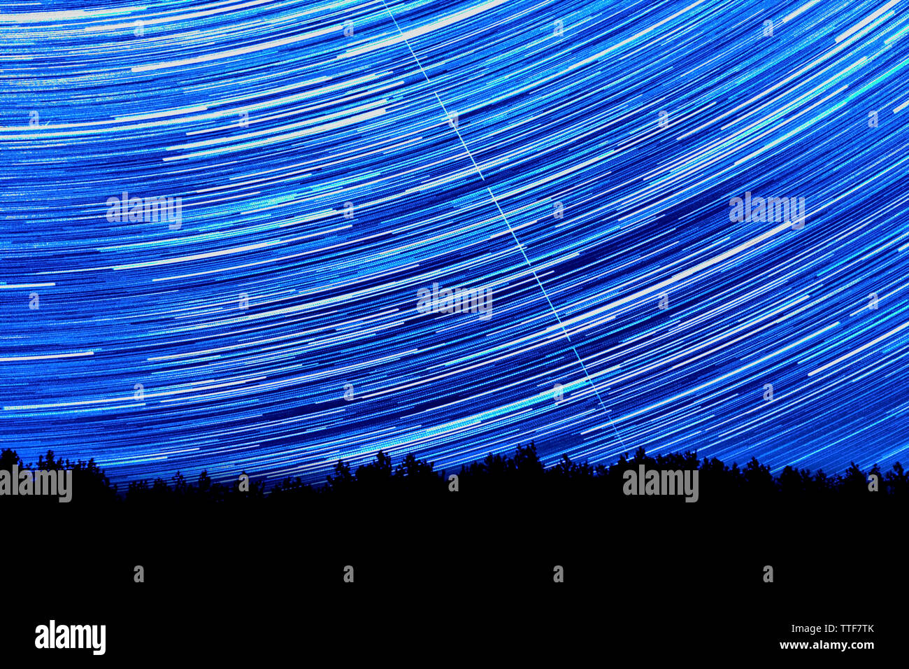 Wonderful beautiful night sky star trail over the river and forest in ...