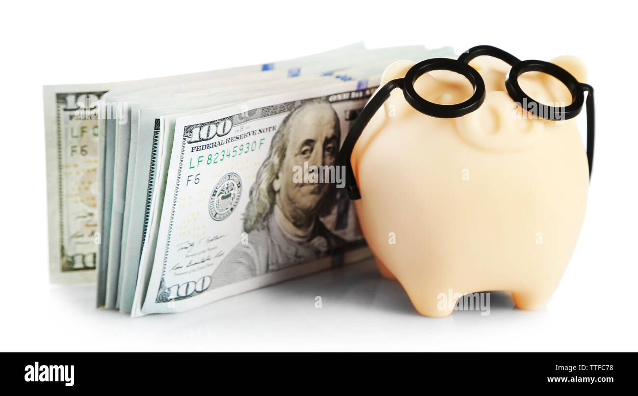 Piggy bank in glasses with dollars isolated on white Stock Photo - Alamy
