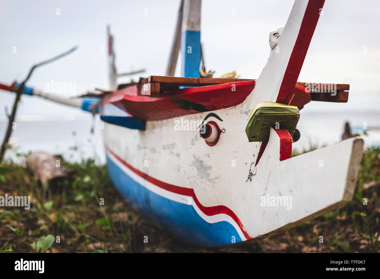 Detail of a Traditional Indonesia Boat (Jukung) on a Beach in Bali Stock Photo