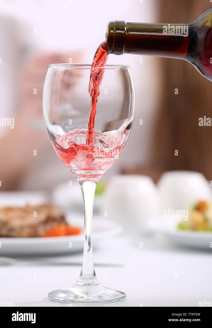 Dinner with wine in restaurant Stock Photo Alamy