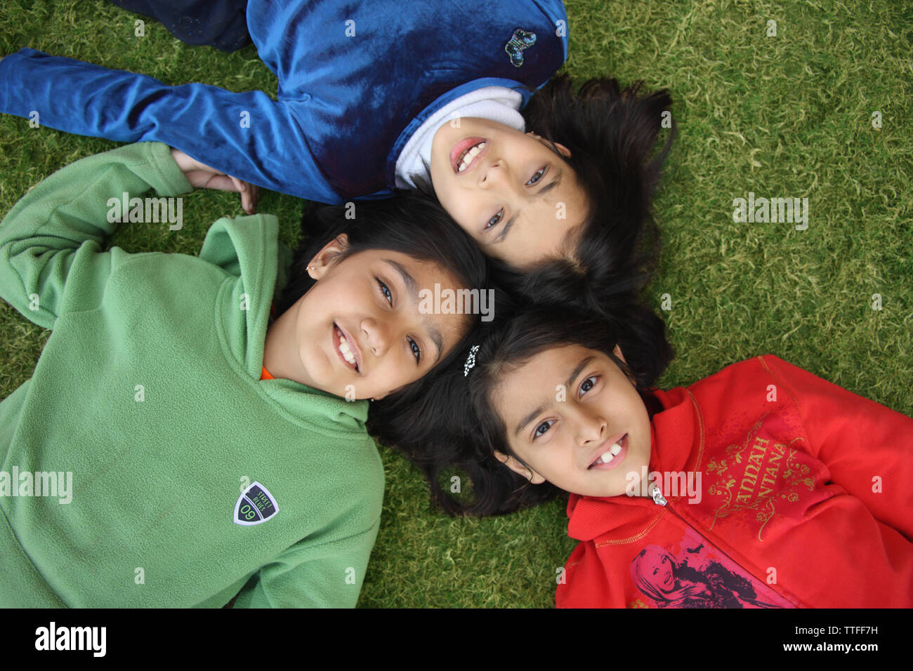 Preteen girl lying on back hi-res stock photography and images - Alamy