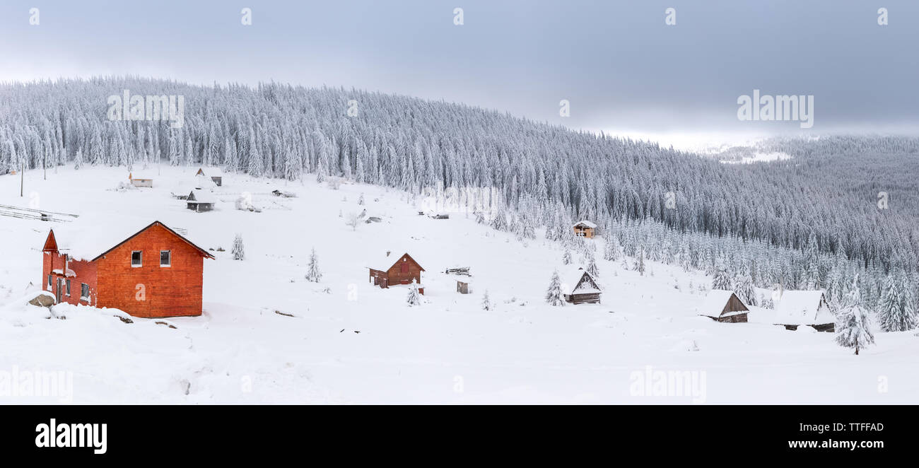 Scene of a rural setting in a panoramic winter setting Stock Photo