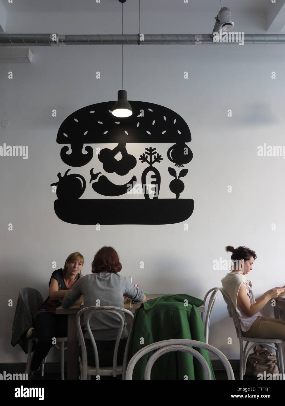 Szene ina a vegetarian burger place in Cracow, Poland Stock Photo