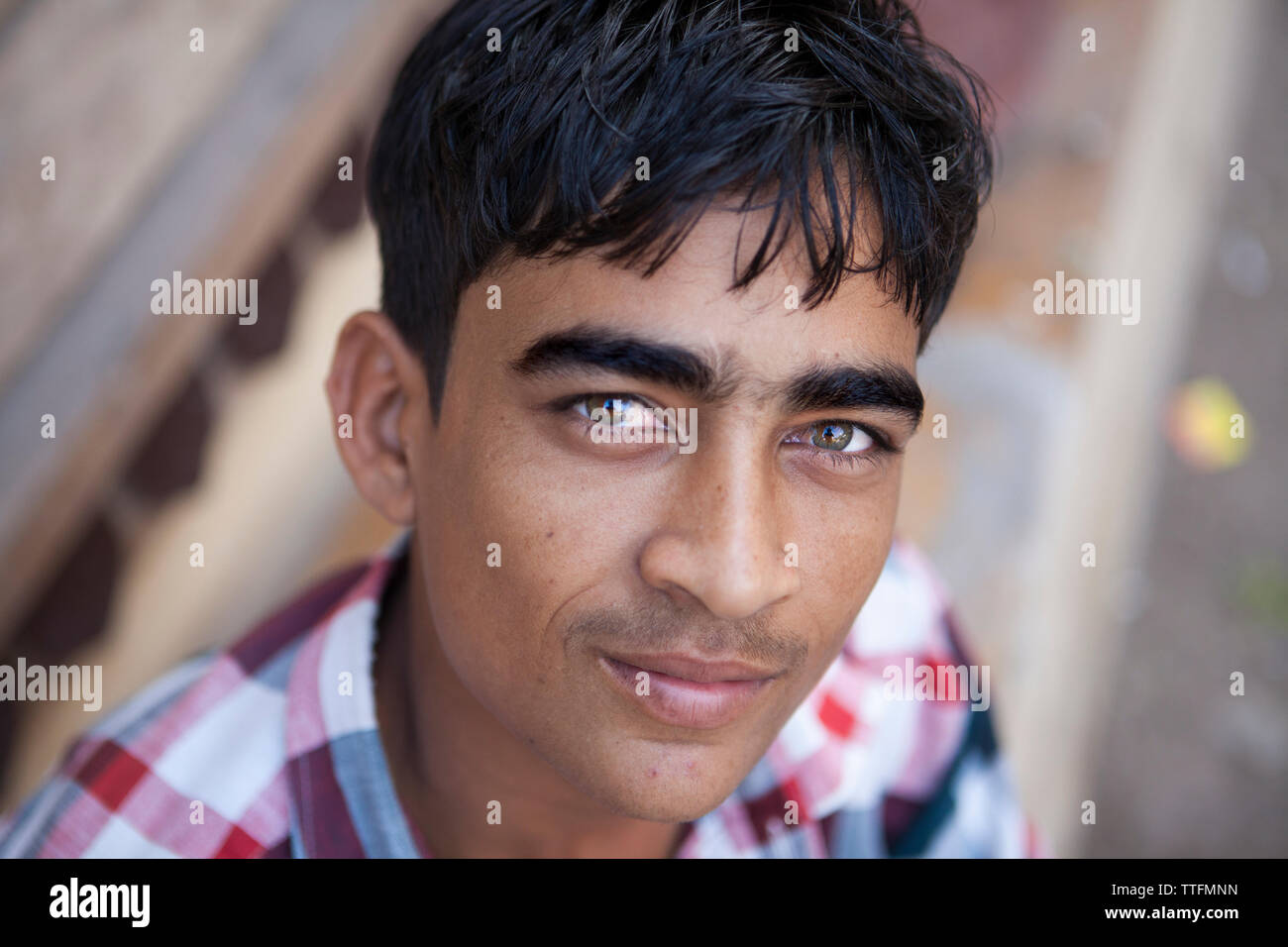 portrait-of-indian-15-years-old-boy-in-the-street-of-delhi-india-stock