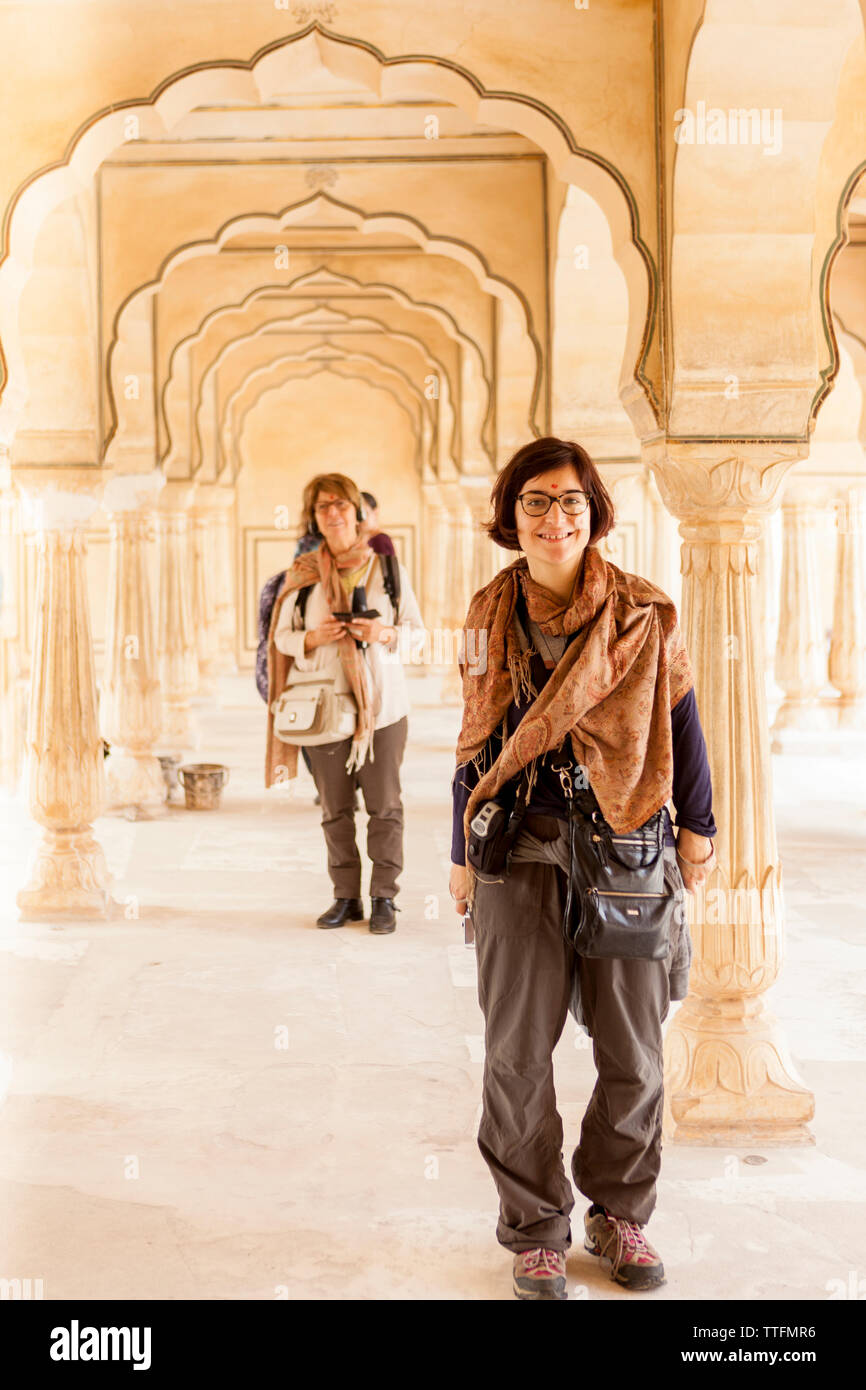 Two caucasian tourist women inside the Amberfort inJaipur, India Stock Photo