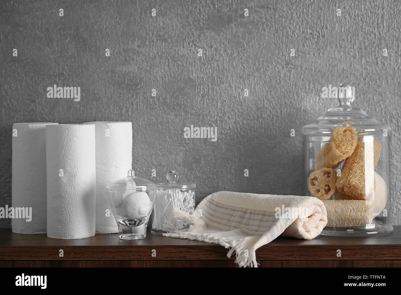 Bath accessories on grey wall background Stock Photo - Alamy
